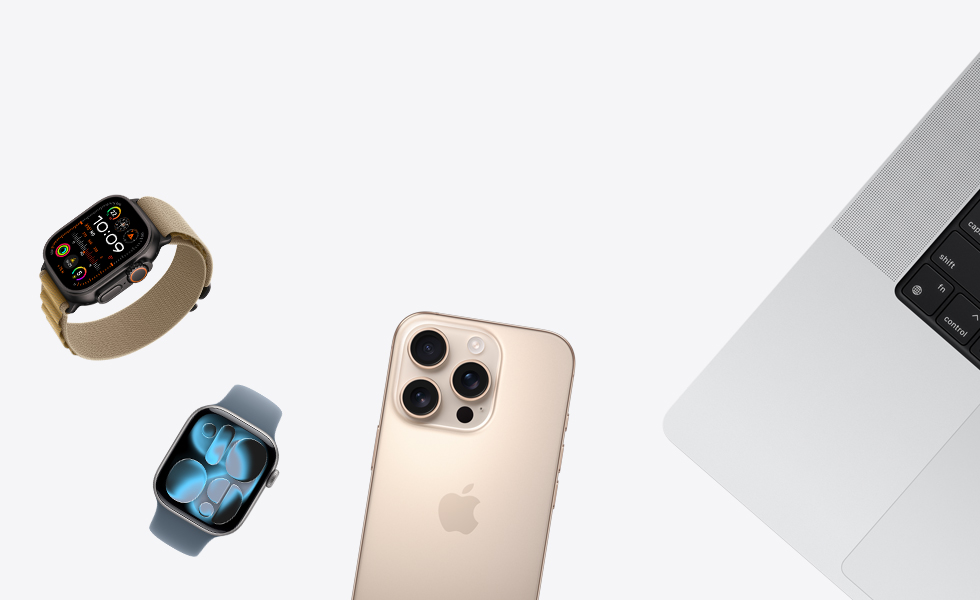 Vários produtos dispersos, incluindo o Apple Watch em Natural e pulseira loop Alpina canela, Apple Watch prateado com pulseira loop esportiva azul-violeta, iPhone titânio-deserto e MacBook prateado