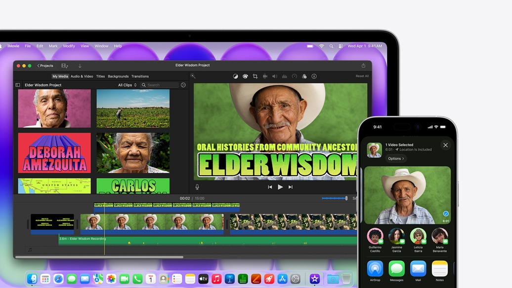 Stříbrný MacBook Neo, na obrazovce je okno iMovie s projektem nazvaným Elder Wisdom Project, vedle je iPhone s videem, na kterém je jeden z lidí v okně iMovie, pod videem jsou vidět možnosti sdílení včetně AirDropu