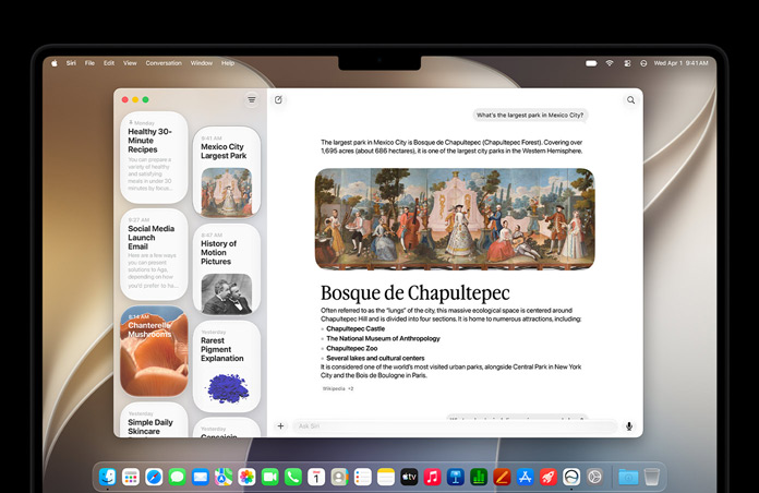 MacBook Pro 14 pollici nero siderale, sul display l’app Siri con una conversazione attiva con Siri AI e le conversazioni precedenti nella barra laterale.