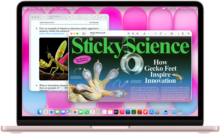MacBook Neo maigi sārtā krāsā, ekrānā redzams raksts par biomīmikriju un tests par šo pašu tēmu