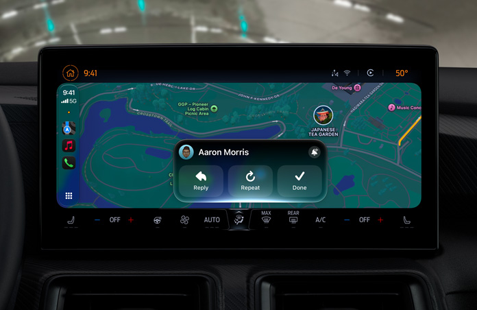 A CarPlay screen showing a Messages notification, with Maps visible in the background